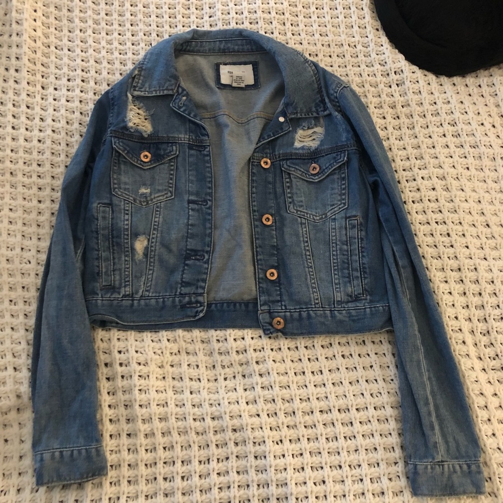 Distressed jean jacket